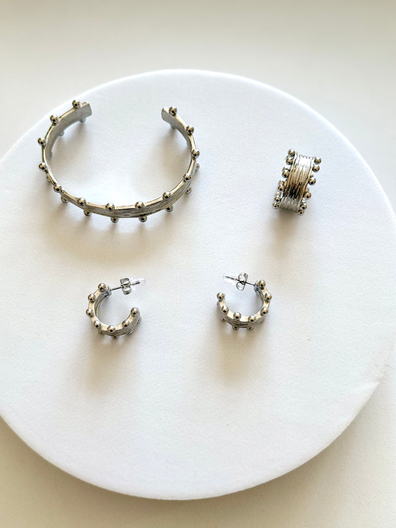 HELINA | ህሊና SILVER dotted earrings, bracelet, and ring set.